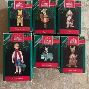 Set of 6 Hallmark Winnie the Pooh ornaments.